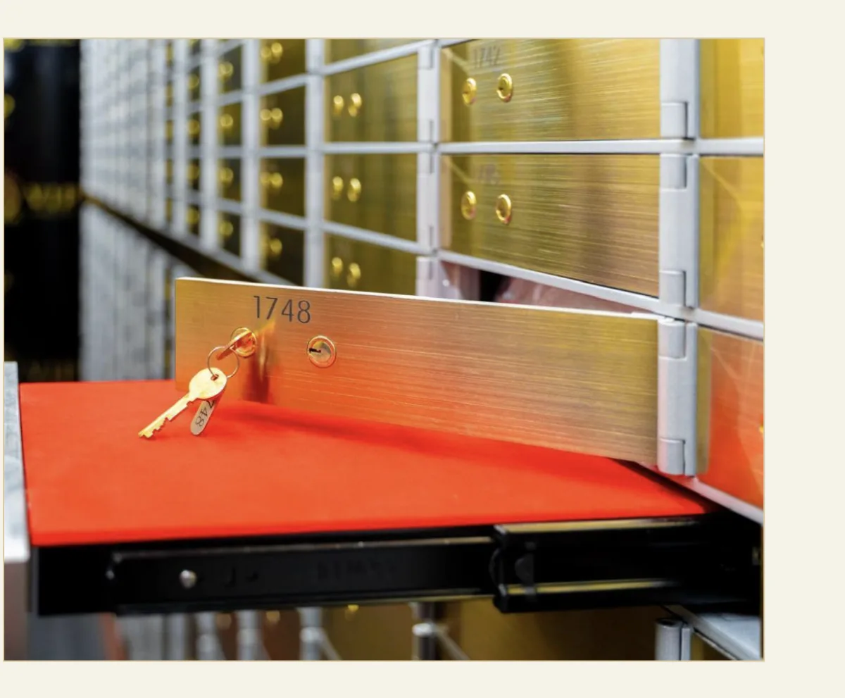 Safe deposit box 1748 with keys on a red tray